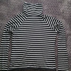 A black and white striped long sleeve turtleneck